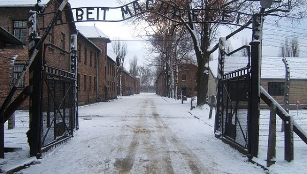 The entrance to the concentration camp Auschwitz I reads "Arbeit macht frei" -- "Work makes (one) free." (Wikimedia Commons)